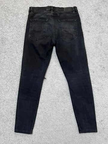 Amiri MX-1 Black Cashew Flower Split Patches Skinny Jeans