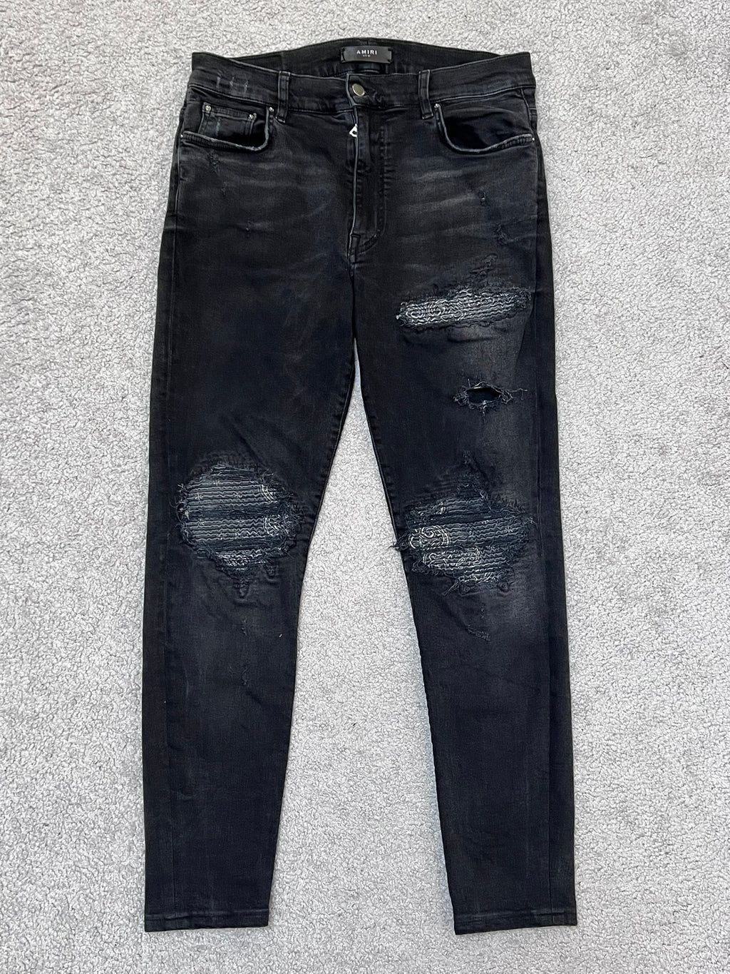 Amiri MX-1 Black Cashew Flower Split Patches Skinny Jeans
