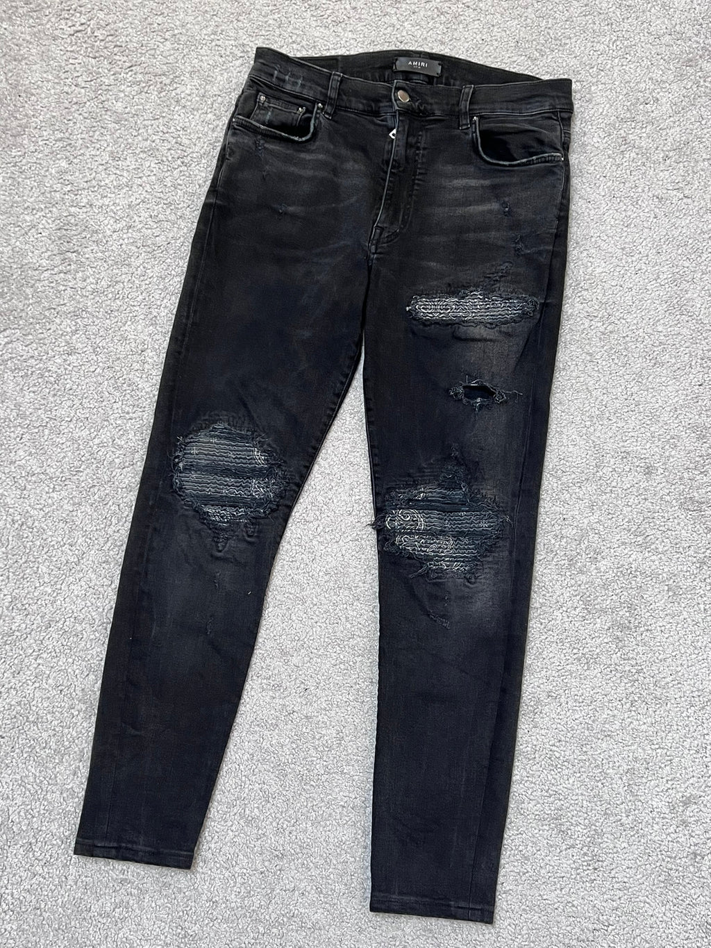 Amiri MX-1 Black Cashew Flower Split Patches Skinny Jeans