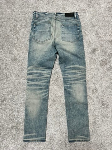 Amiri MX-1 “Dirty Indigo” Red Bandana Patch Jeans