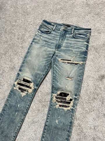 Amiri MX-1 “Dirty Indigo” Red Bandana Patch Jeans