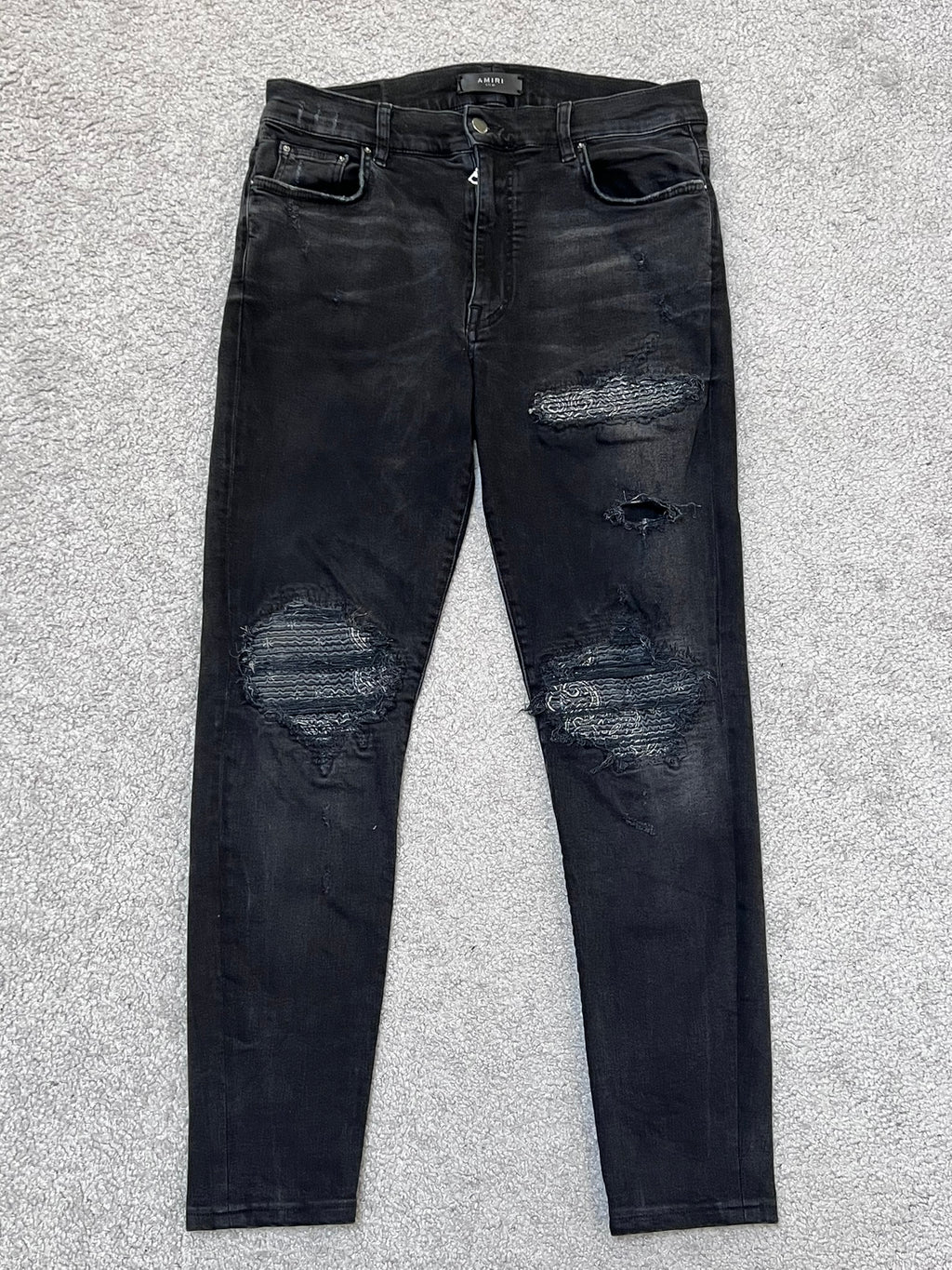 Amiri MX-1 Black Cashew Flower Split Patches Skinny Jeans