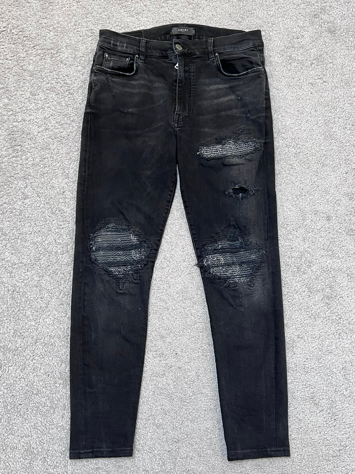 Amiri MX-1 Black Cashew Flower Split Patches Skinny Jeans